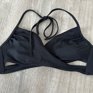 Wrap bikini top from Pink. Size medium. Can be worn on the pink size